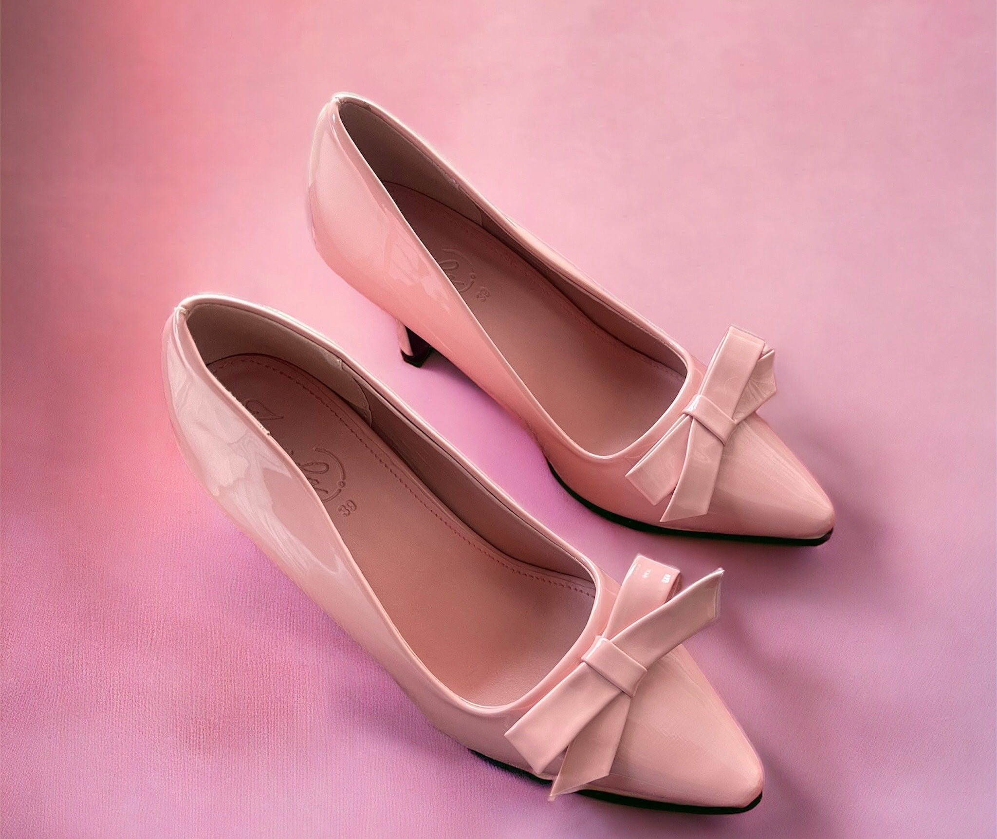 PINK COURT BOW HEELS